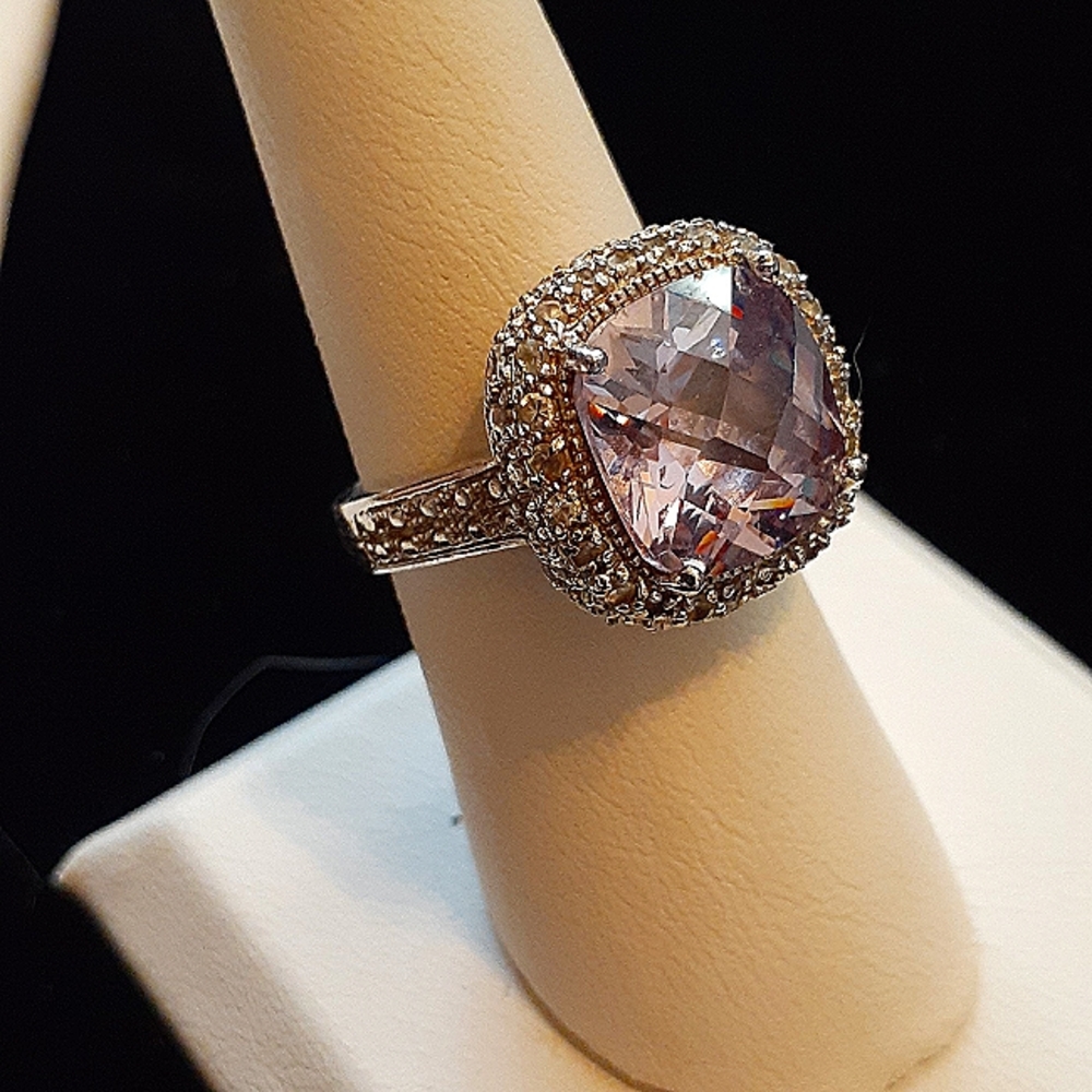 Huge bling cocktail ring.